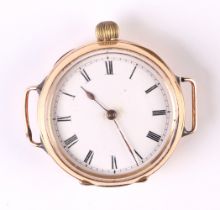 An 18ct gold cased watch, the white enamel dial with Roman numerals, the back of the case