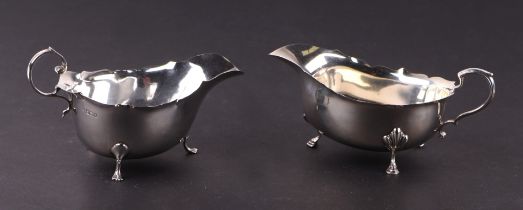 A silver gravy boat; together with another similar smaller, 170g (2).