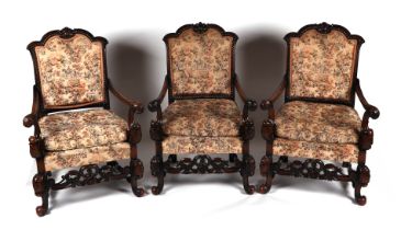 A set of three 1920's Maple & Co. style carved walnut and upholstered 17th century inspired open