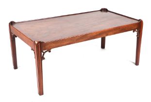 A figured mahogany occasional table on square chamfered legs, 107 by 59cms. Condition Report The