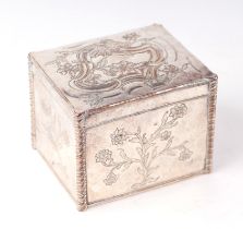 An 18th century Sheffield plate tea caddy with embossed and engraved decoration, 10cms wide.