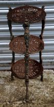 A Victorian style cast iron three-tier pan stand, 65cms high.