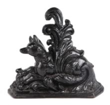 A Regency cast iron door stop depicting a recumbent fox, 29cms high.