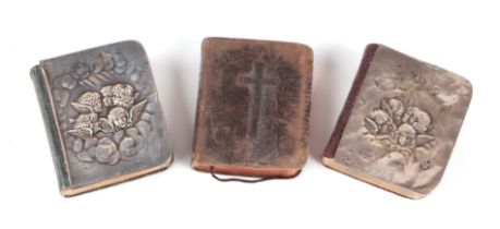 Three miniature Common Prayer books, two with silver covers, after Reynolds (3). Condition Report