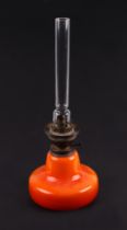 A Danish Oline oil lamp by Fog & Morup, with orange base, overall 39cms high.