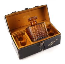 A 1950's style kitsch five-piece liquor set in the form of a doctors leather bag, 25cms wide.