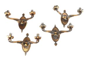 A set of four twin-branch Regency style gilt metal wall lights (4).