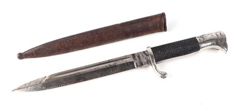 A Third Reich plated dress bayonet by Eickhorn in its steel scabbard. Marked on the ricasso: