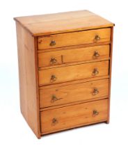 A late Victorian / Edwardian pine table top chest of five graduated long drawers, 36cms wide.