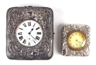 A Goliath type open faced pocket watch in a silver mounted leather stand, together with a silver