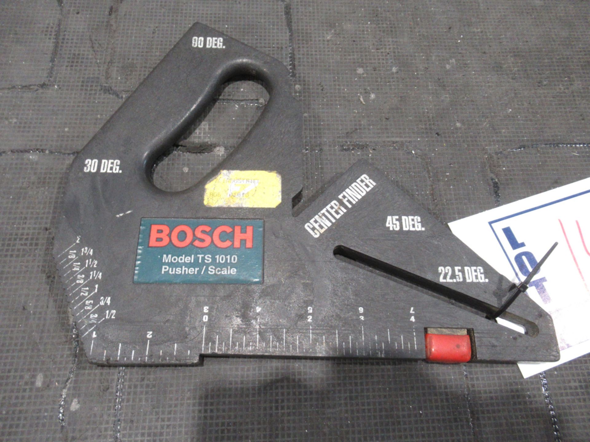 BOSCH TS1010 PUSHER/BRACKET