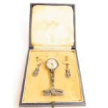 A marcasite set fob watch on a brooch fitting with