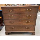 A 19th century oak chest of four long