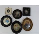 A collection of six portrait miniatures of males an