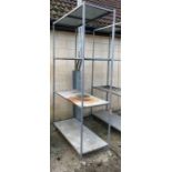 Industrial 4 tier metal shelving unit on castors