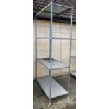 Industrial 4 tier metal shelving unit on castors