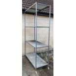 Industrial 4 tier metal shelving unit on castors