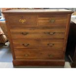 A 20th century hardwood chest of drawers, of two s