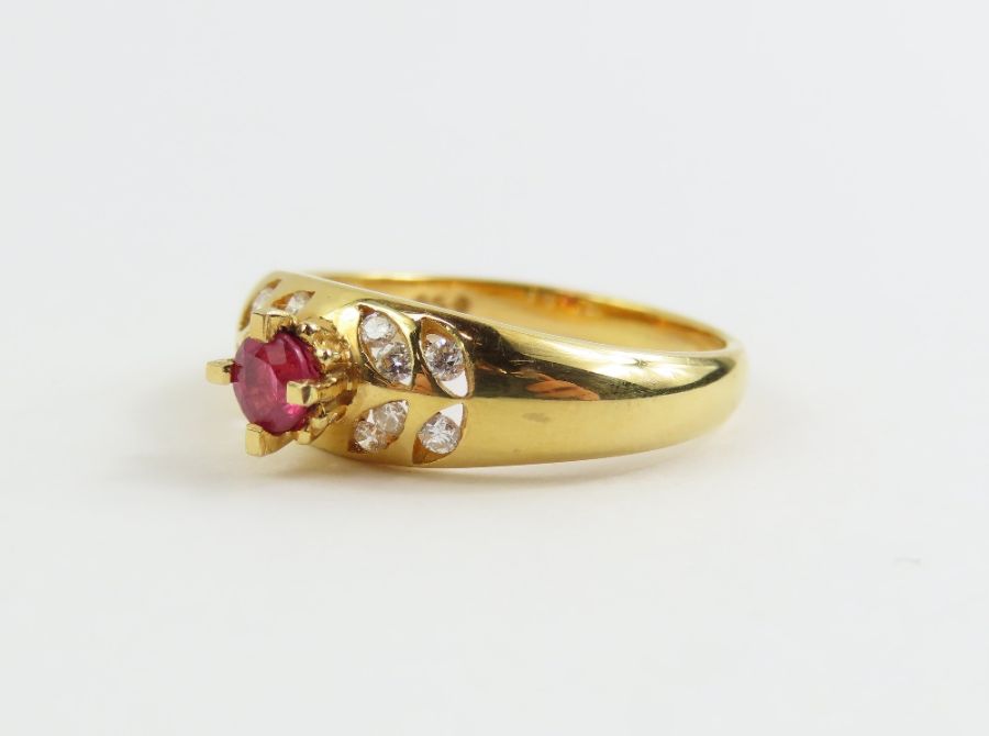 A ruby and diamond dress ring, the round ruby appr - Image 10 of 12