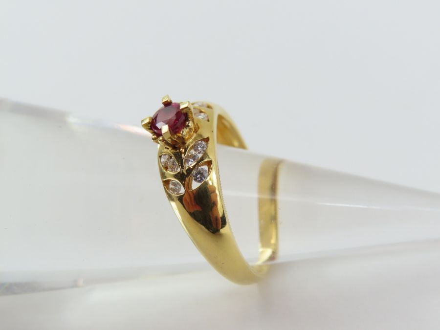 A ruby and diamond dress ring, the round ruby appr - Image 2 of 12