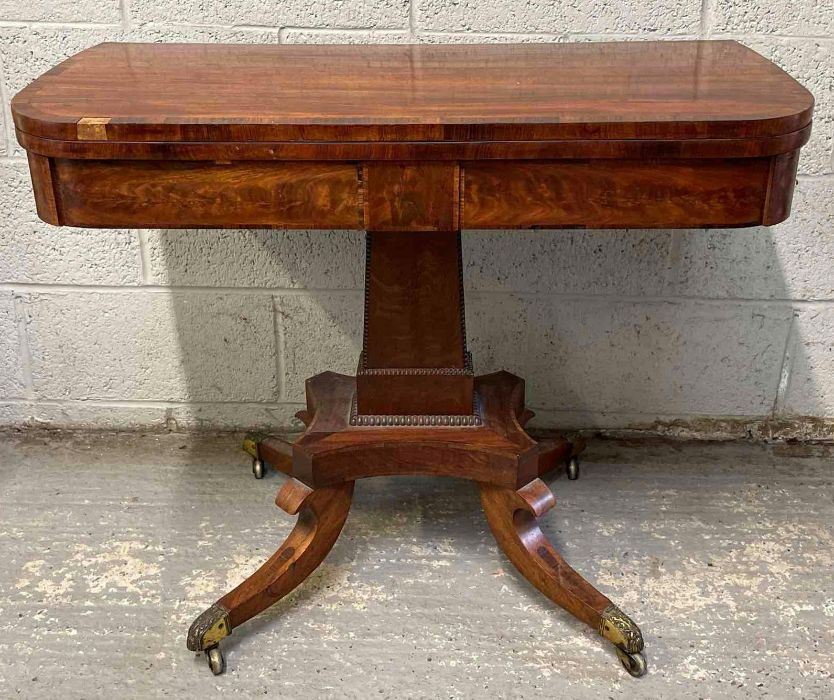 A 19th century mahogany foldover card table, stand