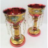 A pair of Victorian gilded table lustres, decorated
