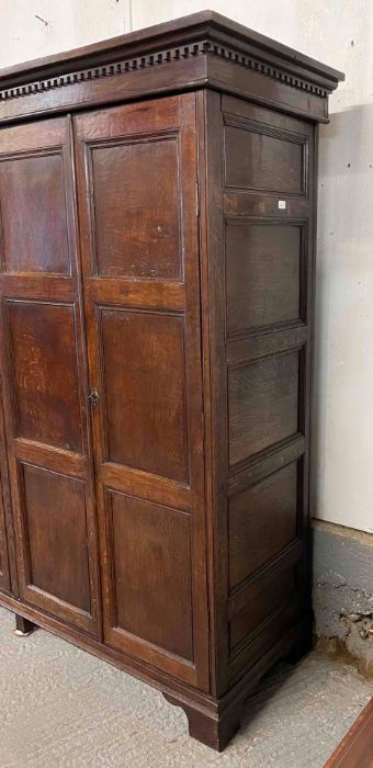 A 19th century oak four door wardrobe, of panelled - Image 4 of 5