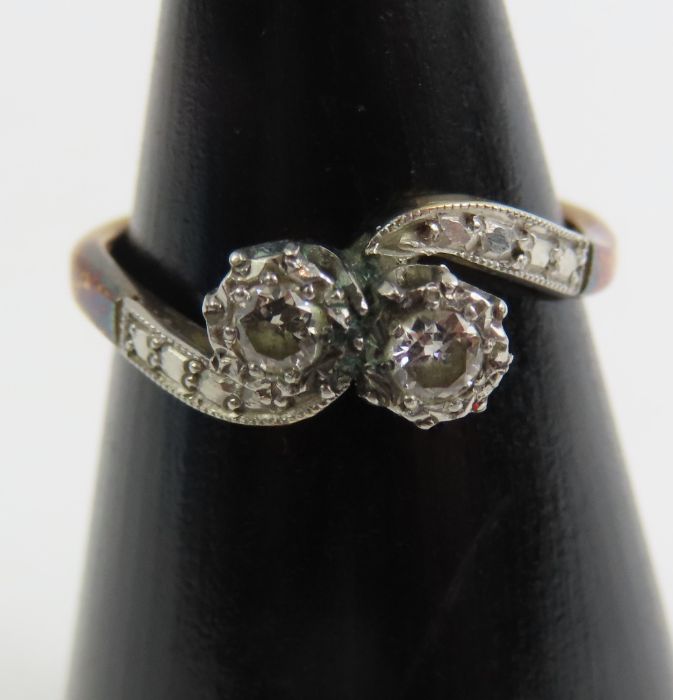 A diamond two stone twist ring, marked '18ct plat' - Image 2 of 3