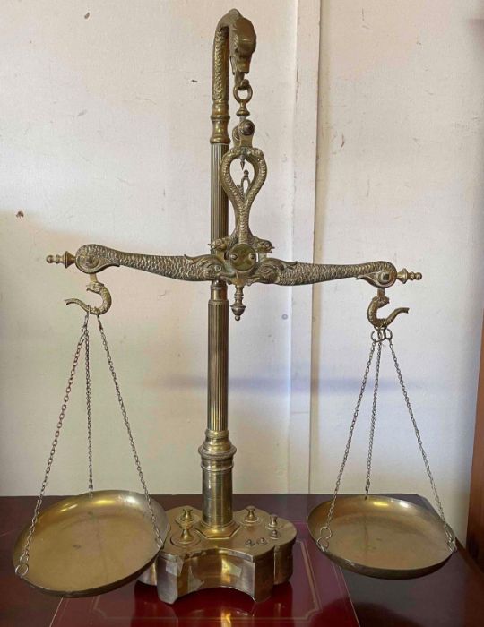 A 20th century brass set of hanging scales and wei