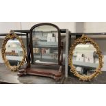 A pair of gilt plaster mirrors, along with a 19th