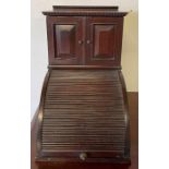 A 20th century mahogany smokers cabinet, with pipe