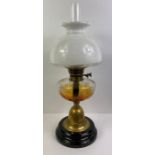 A 20th century oil lamp, with white glass reservoir