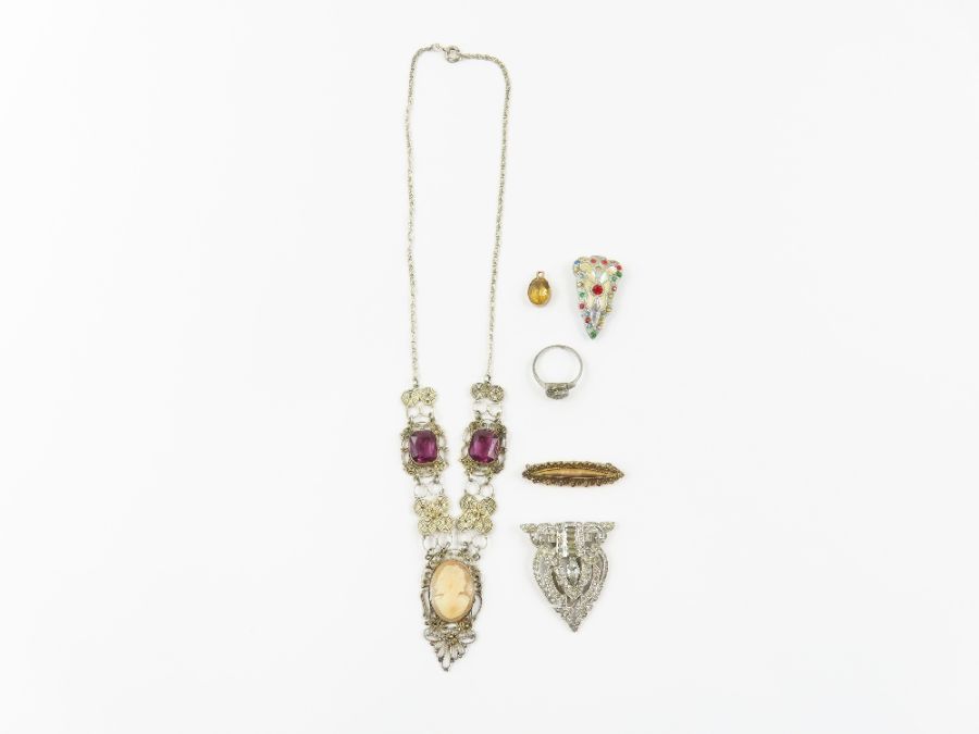 A shell cameo and paste set filigree necklace; and