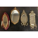 Four 20th century brass mounted wall mirrors, thre