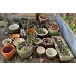 A collection of reconstituted stone, terracotta and