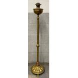 A 20th century brass standard lamp, standing on