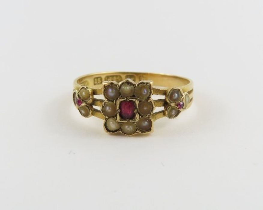 A late Victorian 15 carat gold red stone and split