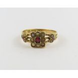 A late Victorian 15 carat gold red stone and split