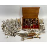 A collection of silver plated cutlery, along with