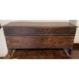 An 18th century primitive oak coffer, dated 1700,