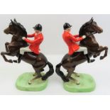 A pair of Beswick models of Huntsman on rearing hor