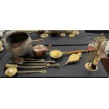 A collection of copper and brass items including a