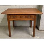 A 20th century oak Arts and Crafts side table, with