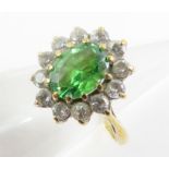 A 9ct gold green stone and cubic zirconia cluster