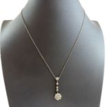 An Edwardian style paste set pendant on chain, the