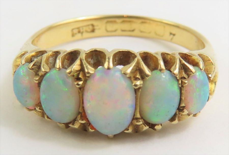 A late 19th/early 20th century opal five stone ring