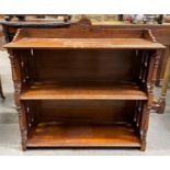 An early 20th century mahogany open bookcase, with