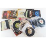 A collection of 45's, various artists and record l