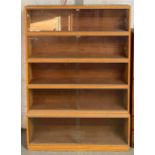 A mid century five section "simplex" bookcase, wit