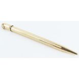 A 9ct gold propelling pencil, with engine turned d